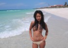 Sexy Asians topless pose on the beach