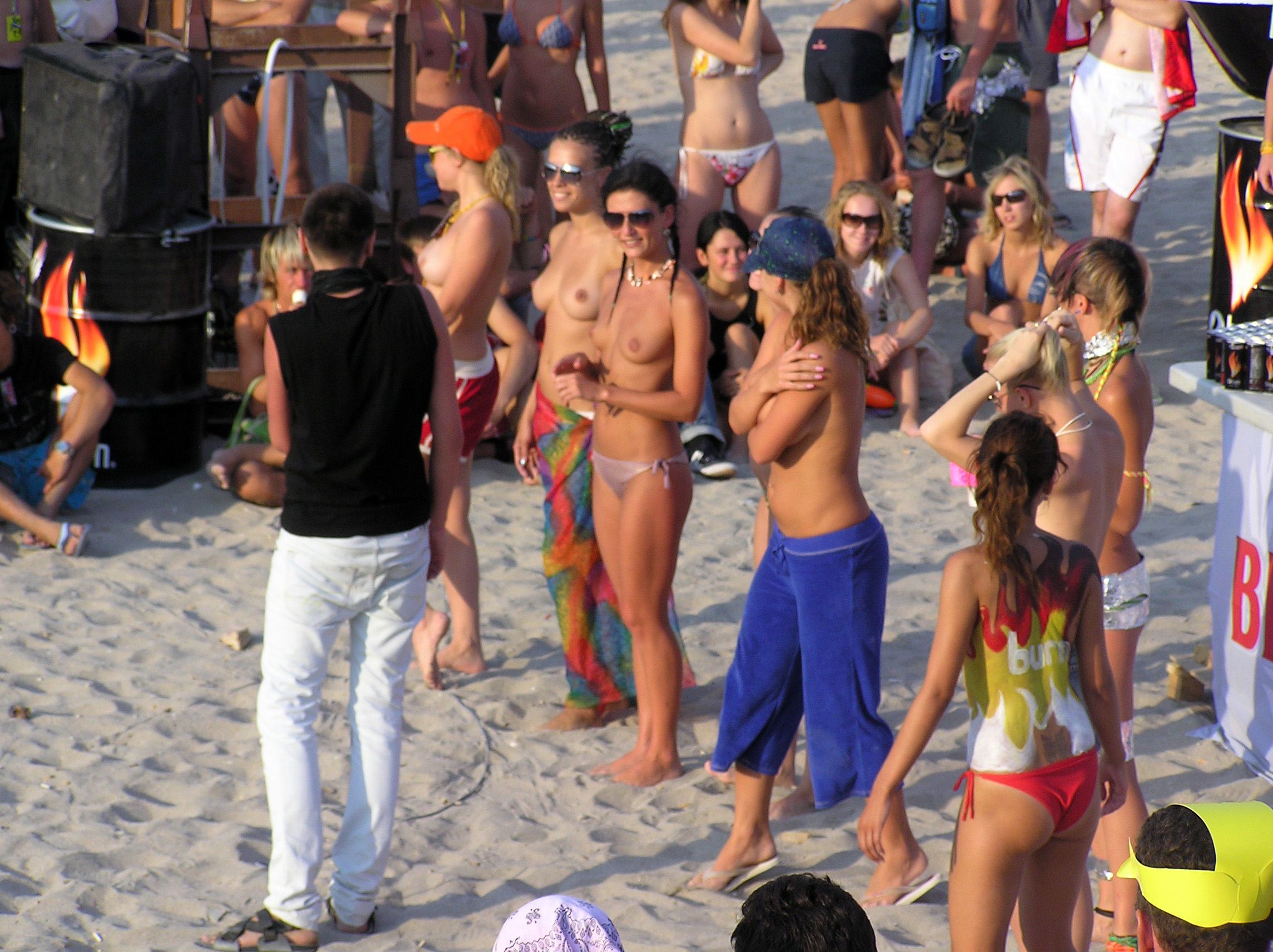 Beach party with hot topless babes