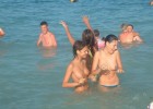 Topless babes caught having fun in the water