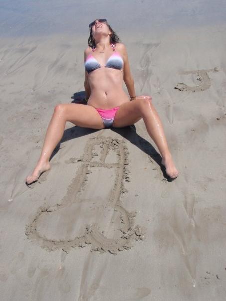 Cutie being playful on the beach