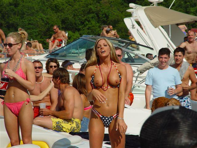 Hot blonde teen showing her tits on a public beach