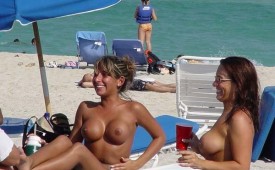 902-Topless-babes-getting-their-boobs-ready.jpg