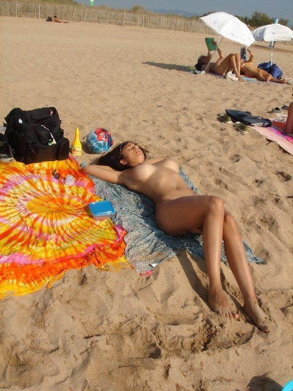 Hot and naked babe on the beach