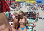 Beach beauties caught topless on crowded sands