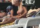 Tempting busty lady caught topless