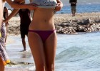 Hot babe expose her purple bikinis and sexy curves