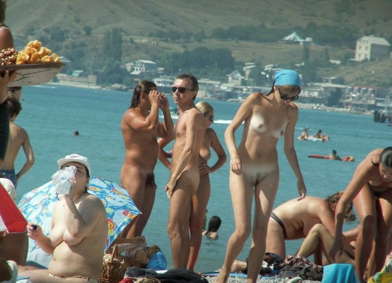 Group of friends enjoying the nude beach